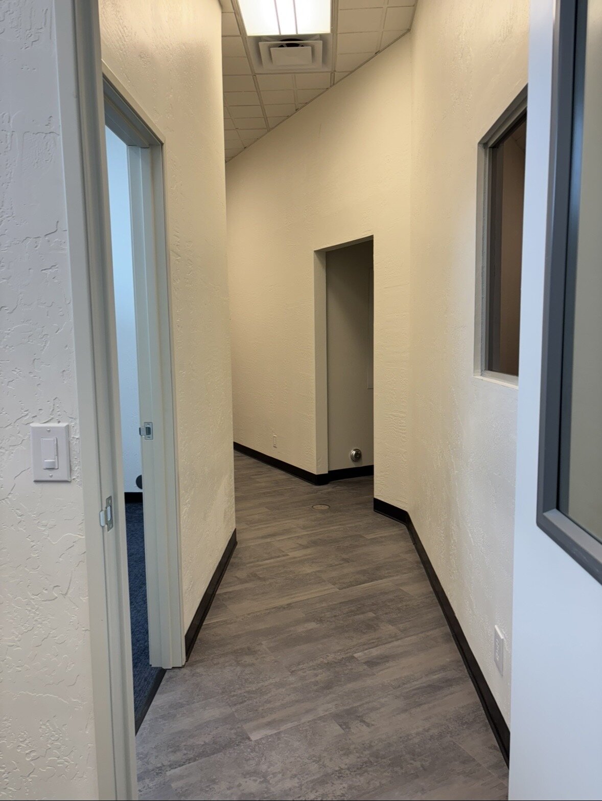 Completed commercial office corridor with new finishes